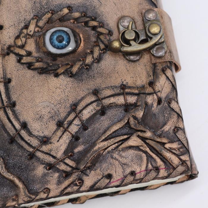 Natūralios odos užrašinė „Evil Eye“, ruda (17×12.5×3 cm), tuščiais lapais